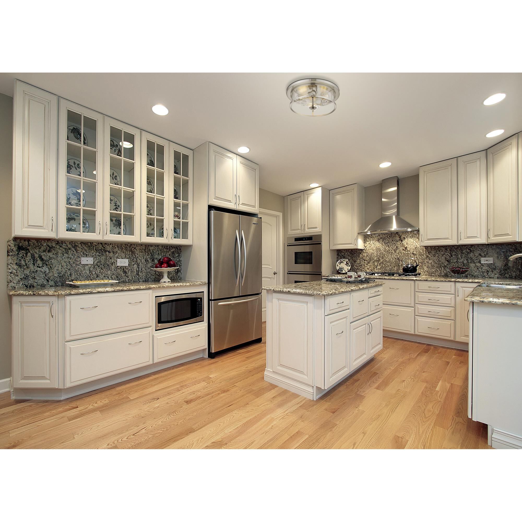 Shown in Brushed Nickel finish and Glass shade