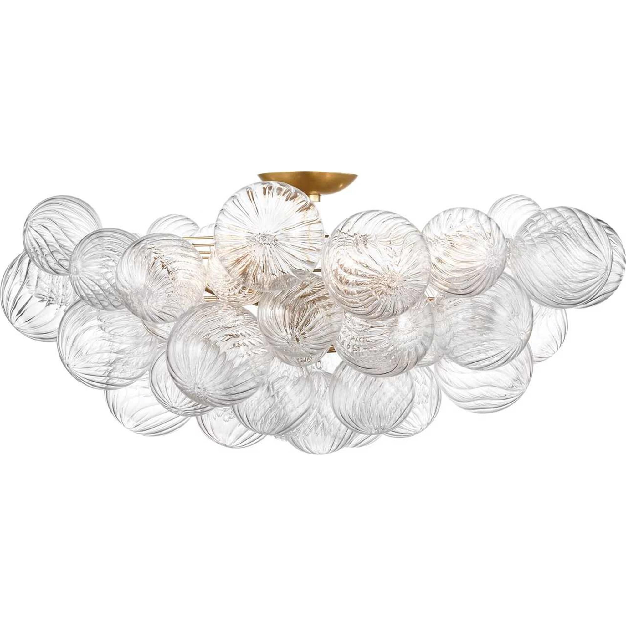 Shown in Gild finish and Clear Swirl glass