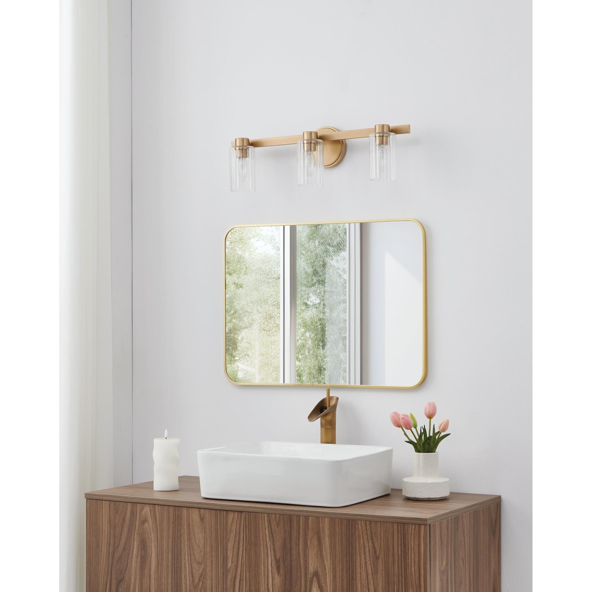 Shown in Champagne Gold finish and Clear Ribbed glass