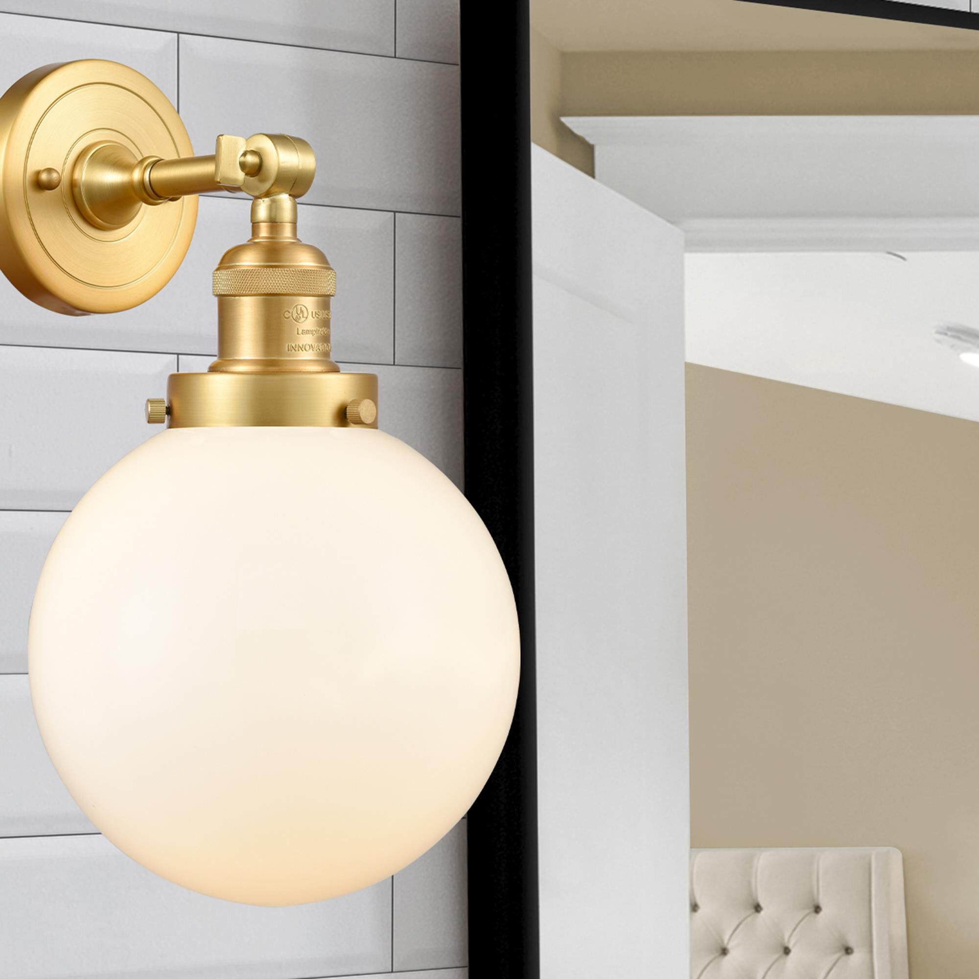 Shown in Satin Gold finish and Matte White Cased Beacon glass