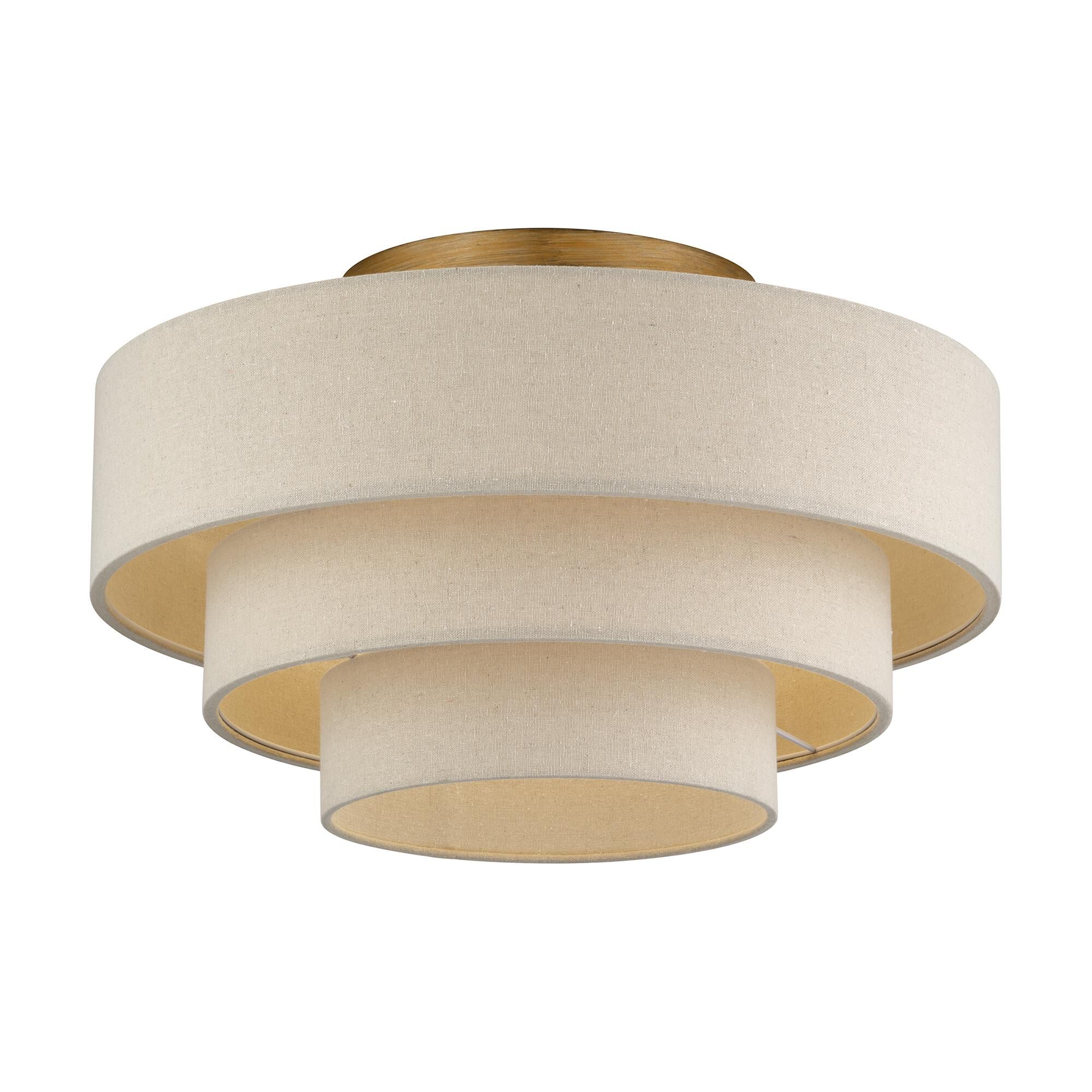 Shown in Antique Gold Leaf finish and Hand Crafted Parchment Color Hardback Fabric shade