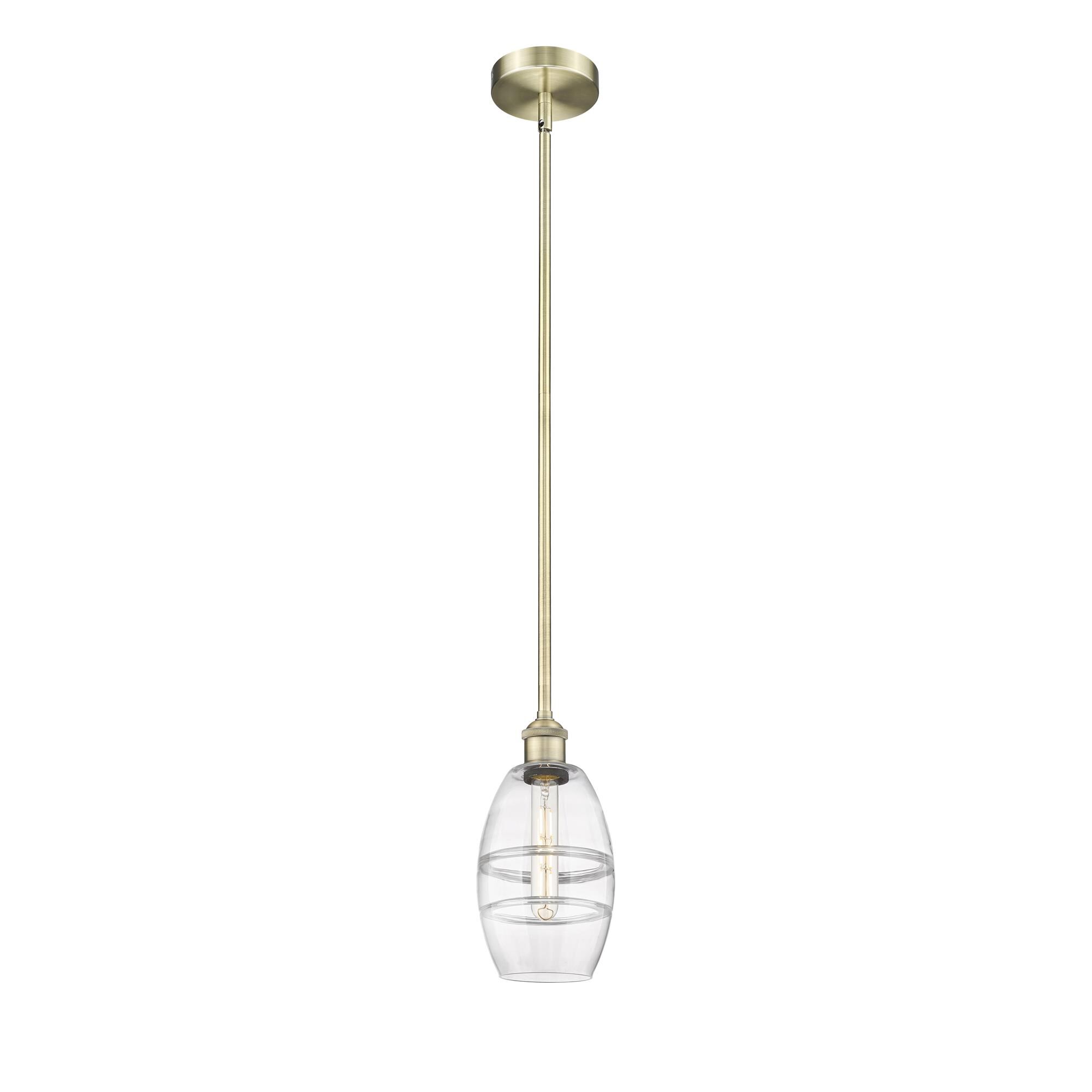 Shown in Antique Brass finish and Clear glass