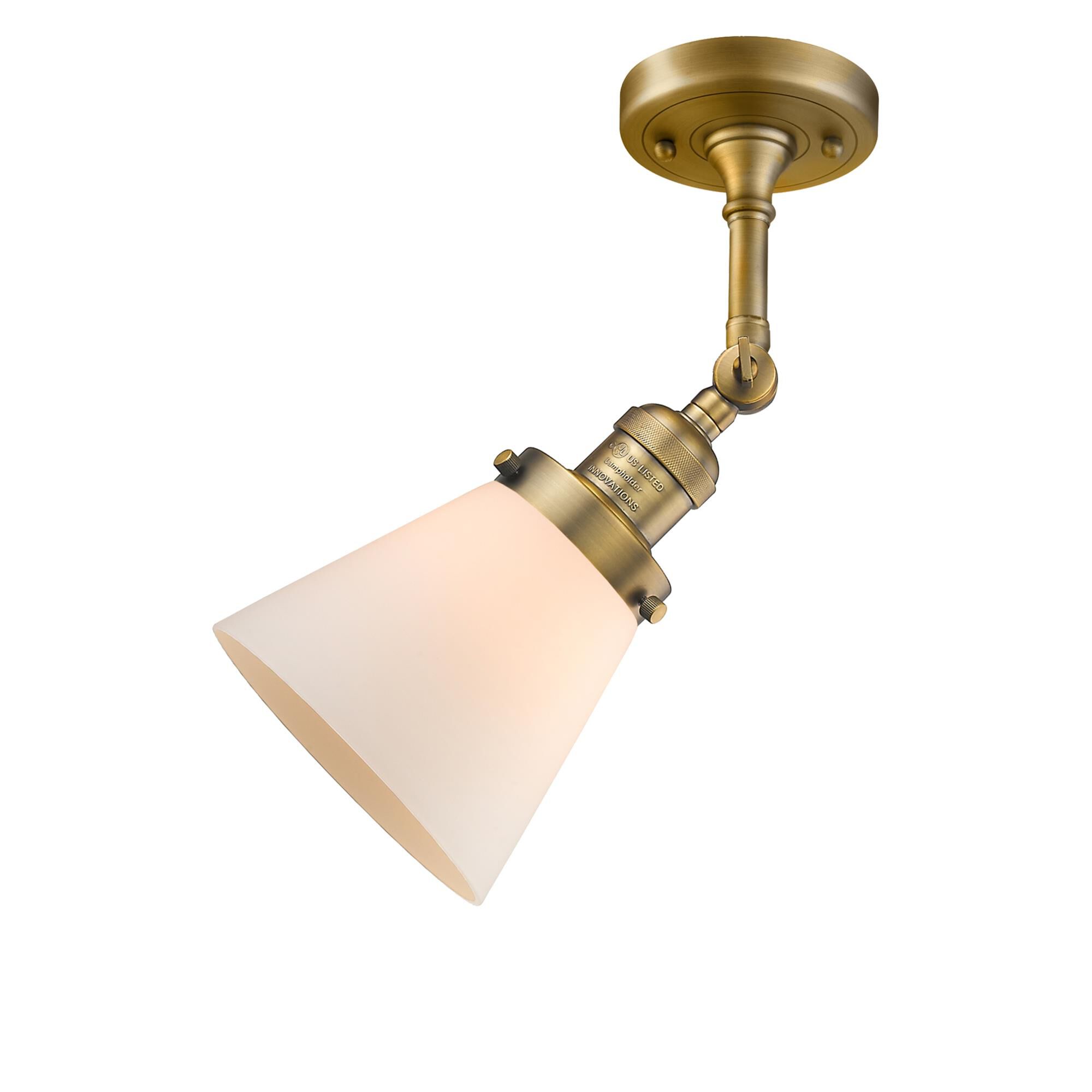 Shown in Brushed Brass finish and Frosted glass and None accent
