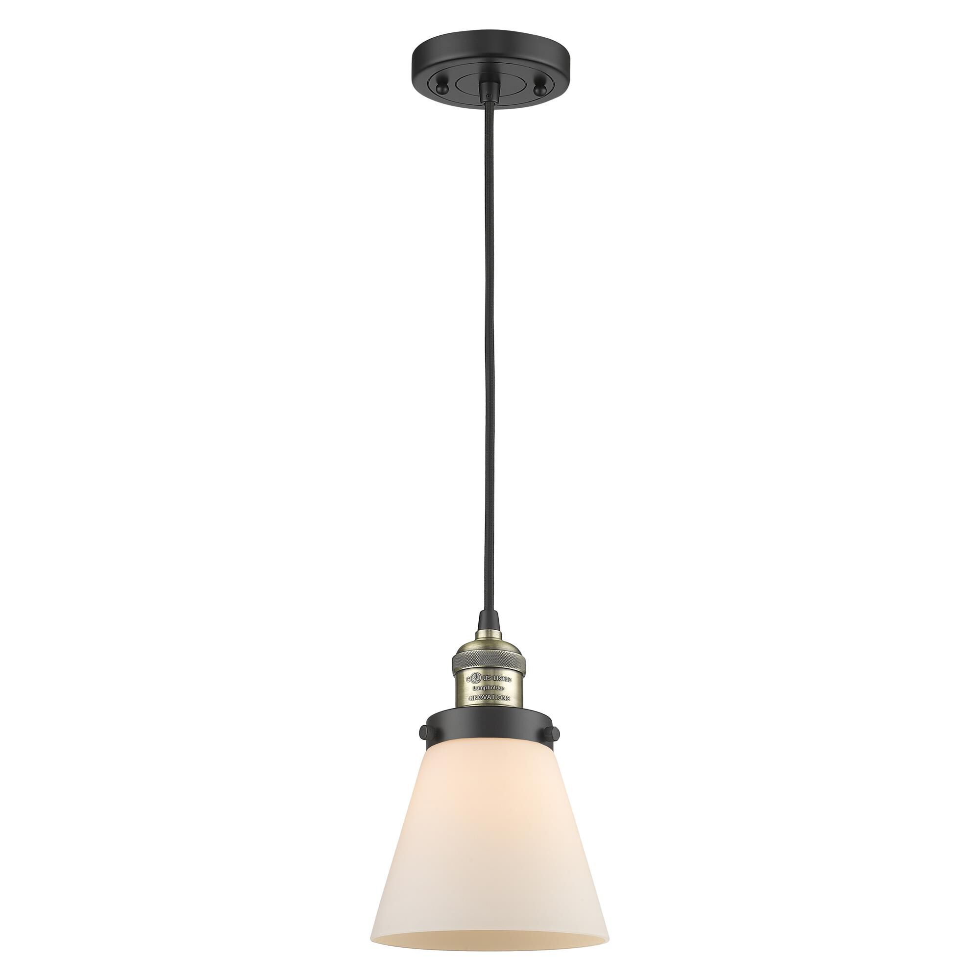 Shown in Black Antique Brass finish and Matte White Cased glass
