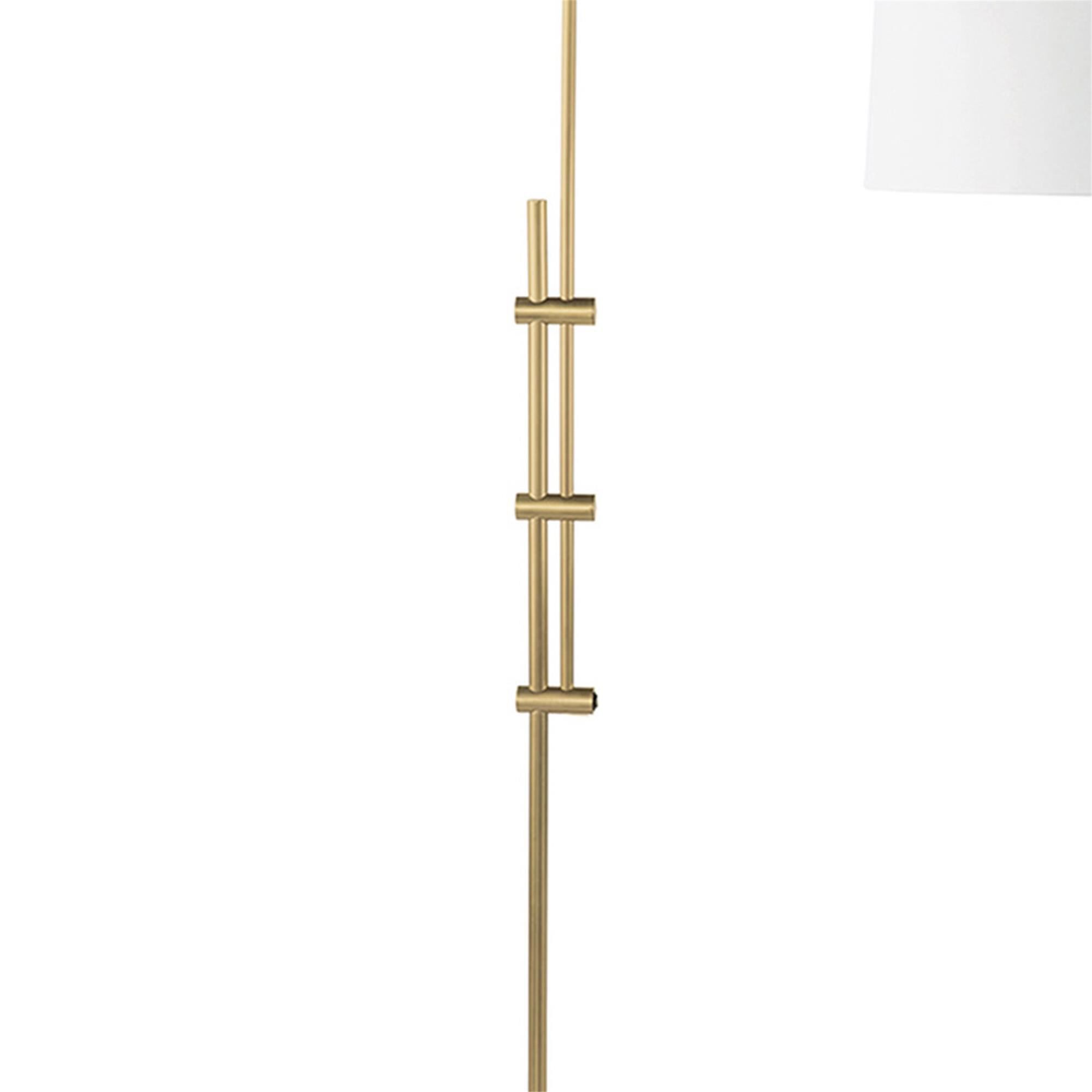 Shown in Natural Brass finish and Linen shade