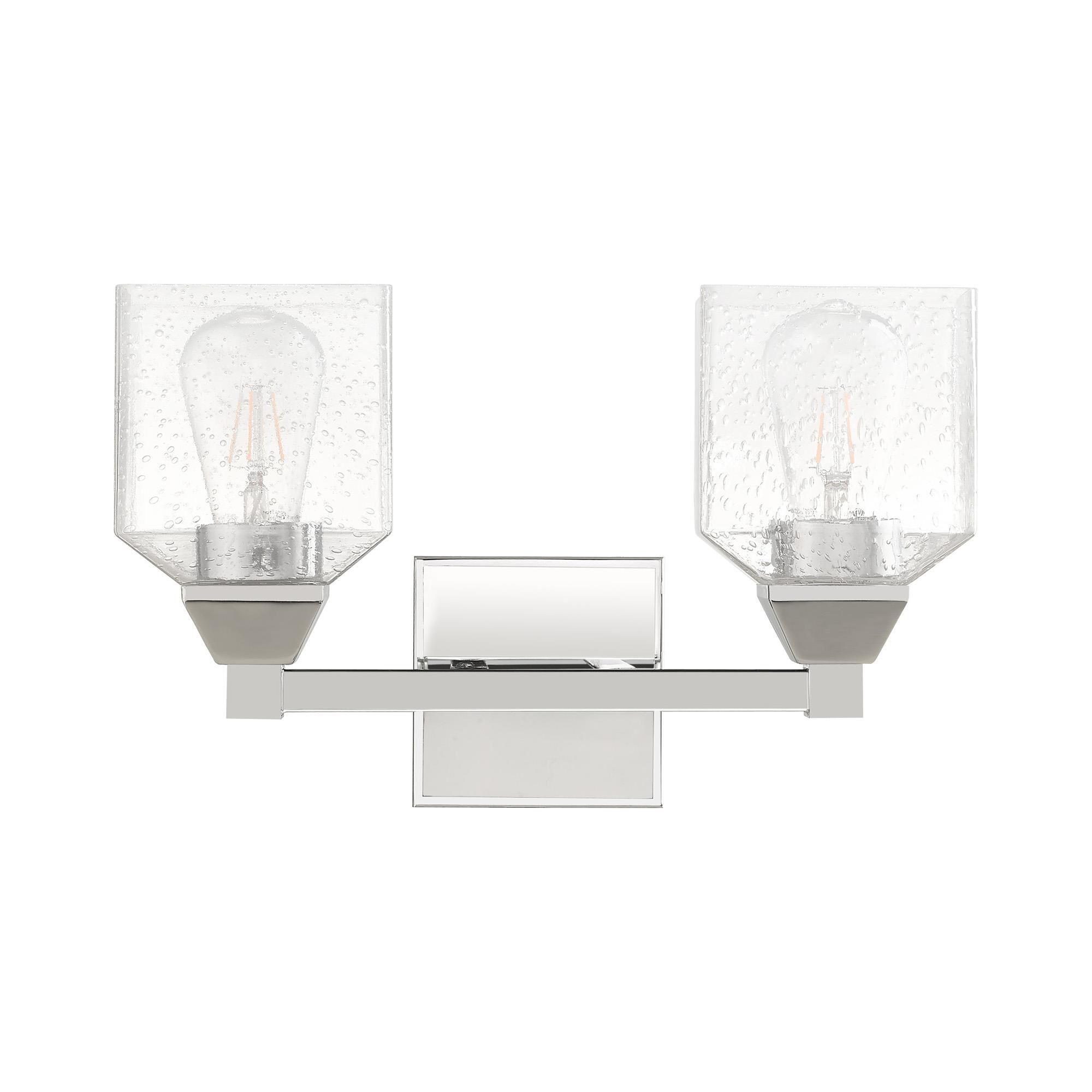 Shown in Polished Chrome finish and Hand Blown Clear Seeded glass