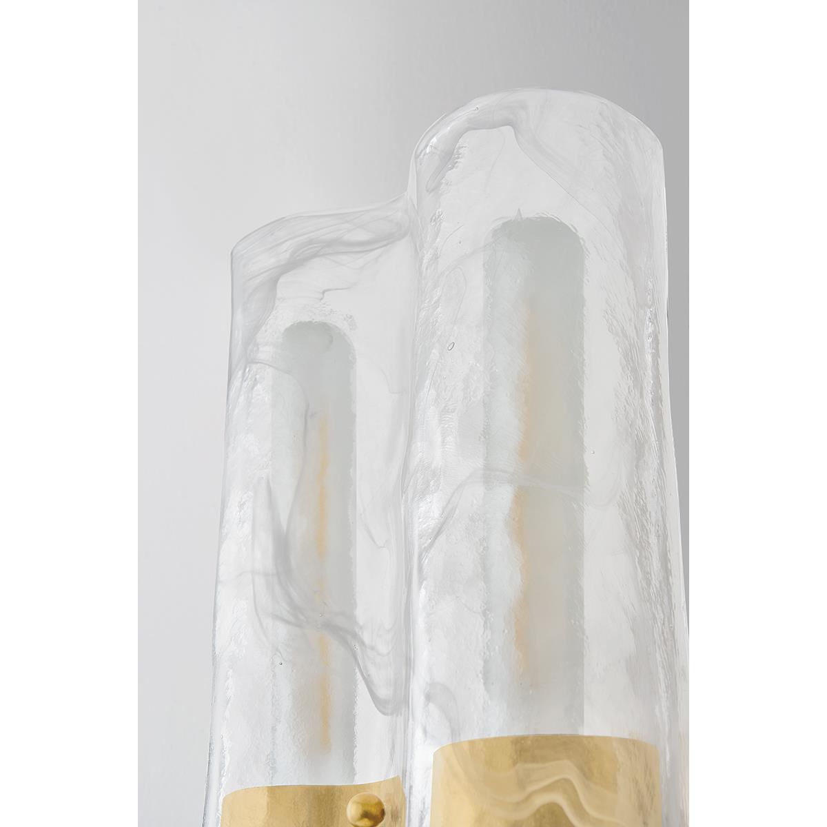 Shown in Vintage Brass finish and Blonchino glass