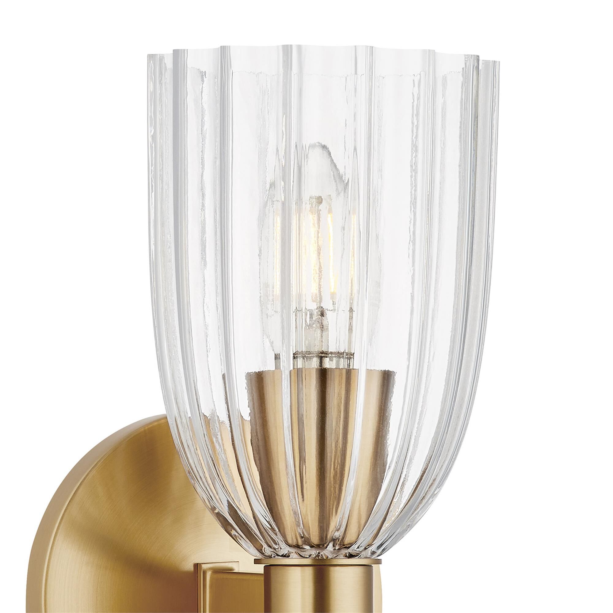 Shown in Natural Brass finish and Clear Pleated glass
