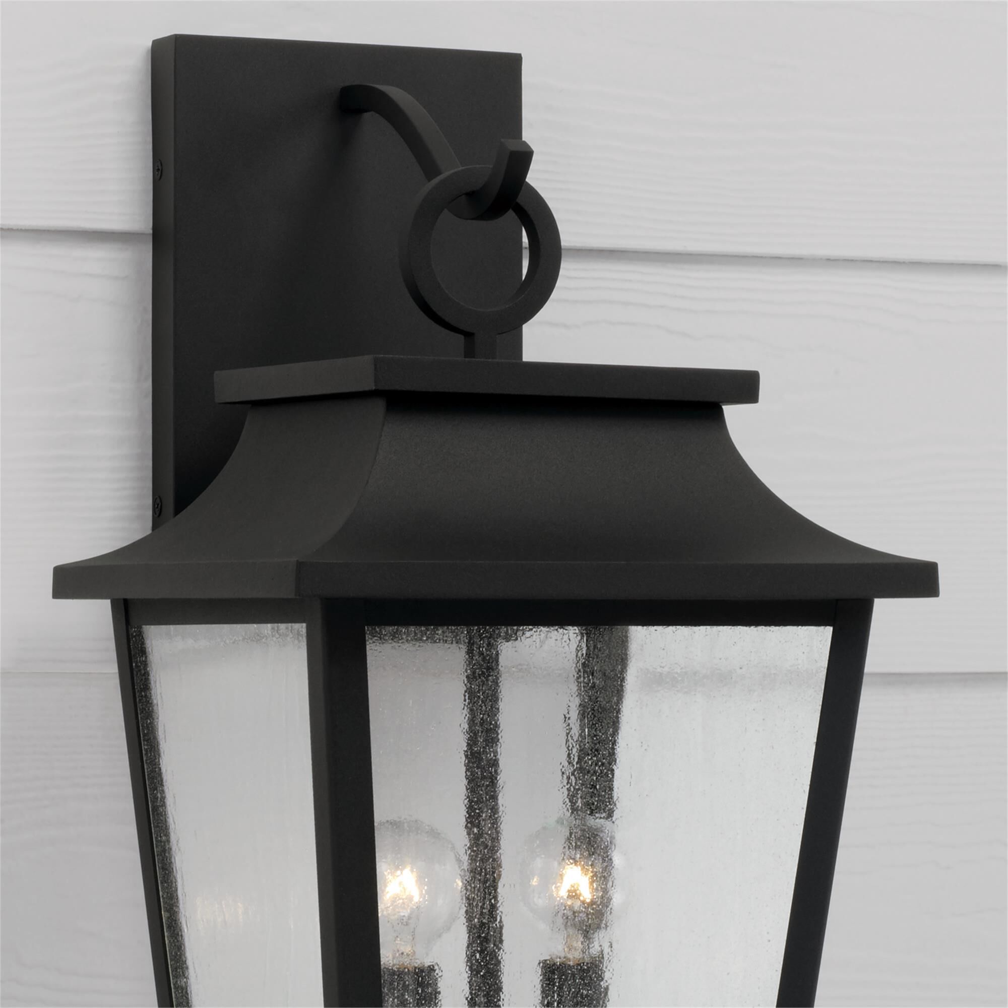 Shown in Black finish and Antiqued glass