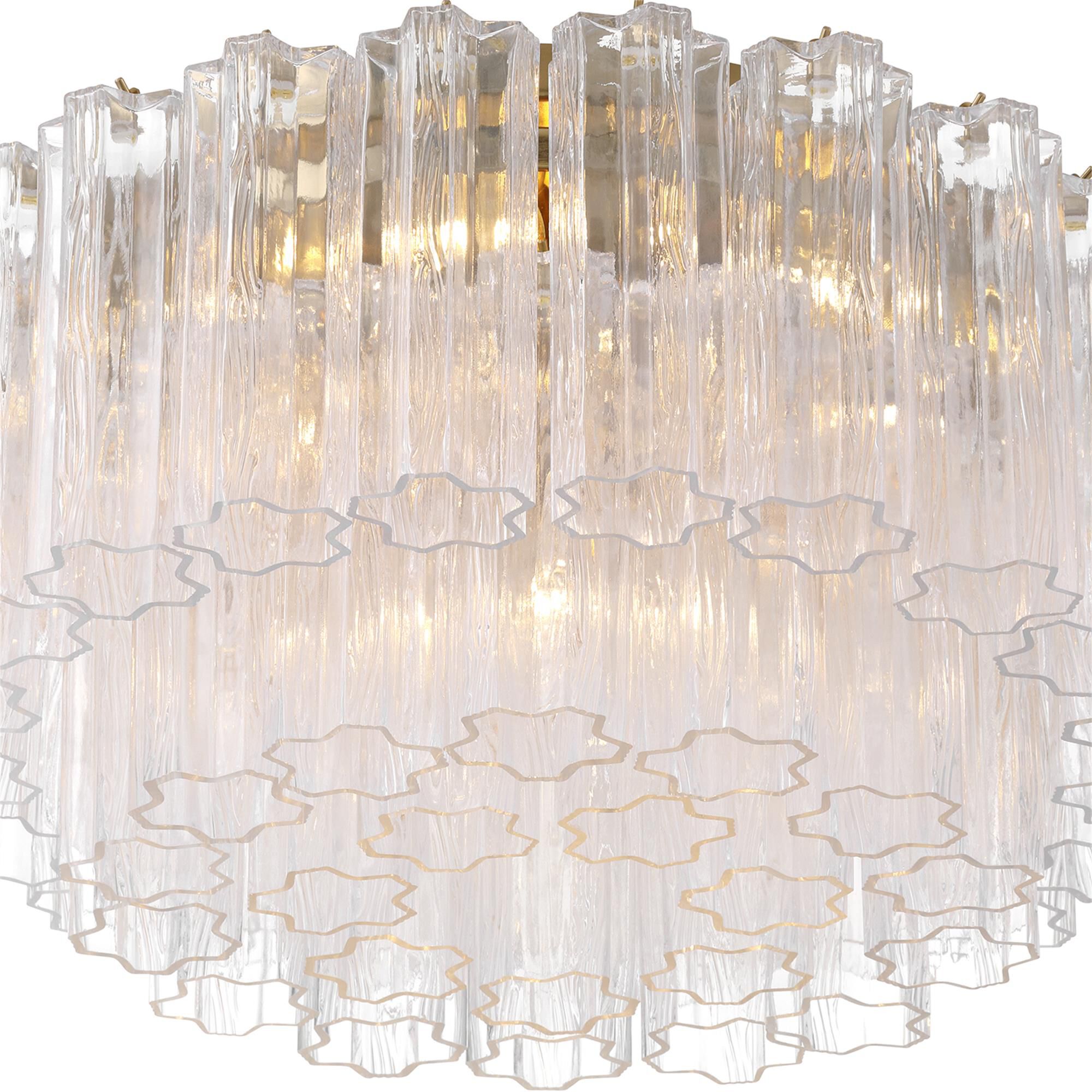 Shown in Aged Brass finish and Tronchi Clear glass