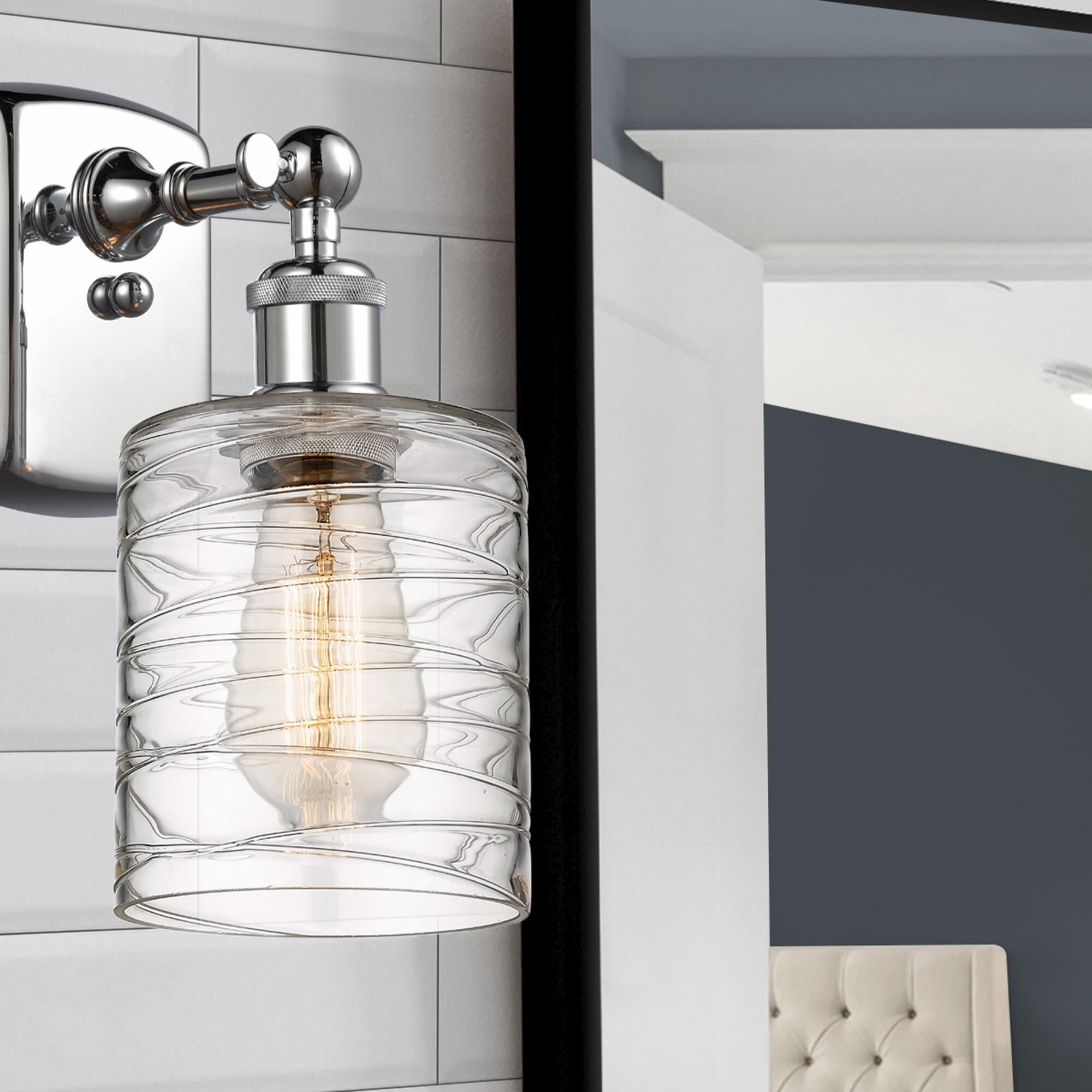 Shown in Polished Chrome finish and Deco Swirl glass