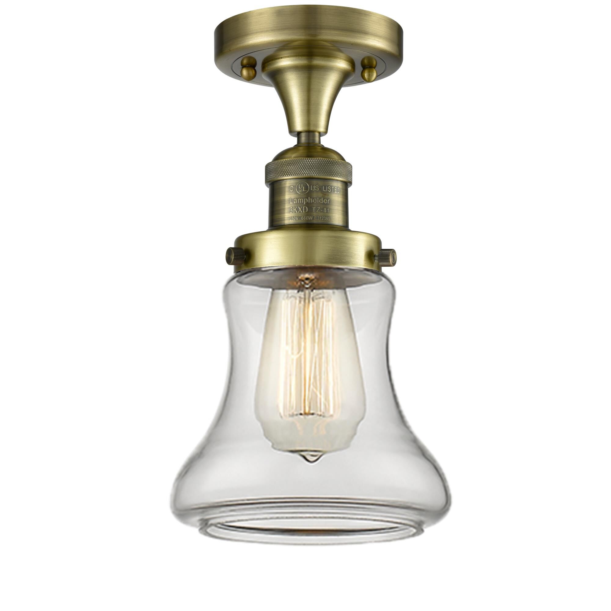 Shown in Antique Brass finish and Clear glass