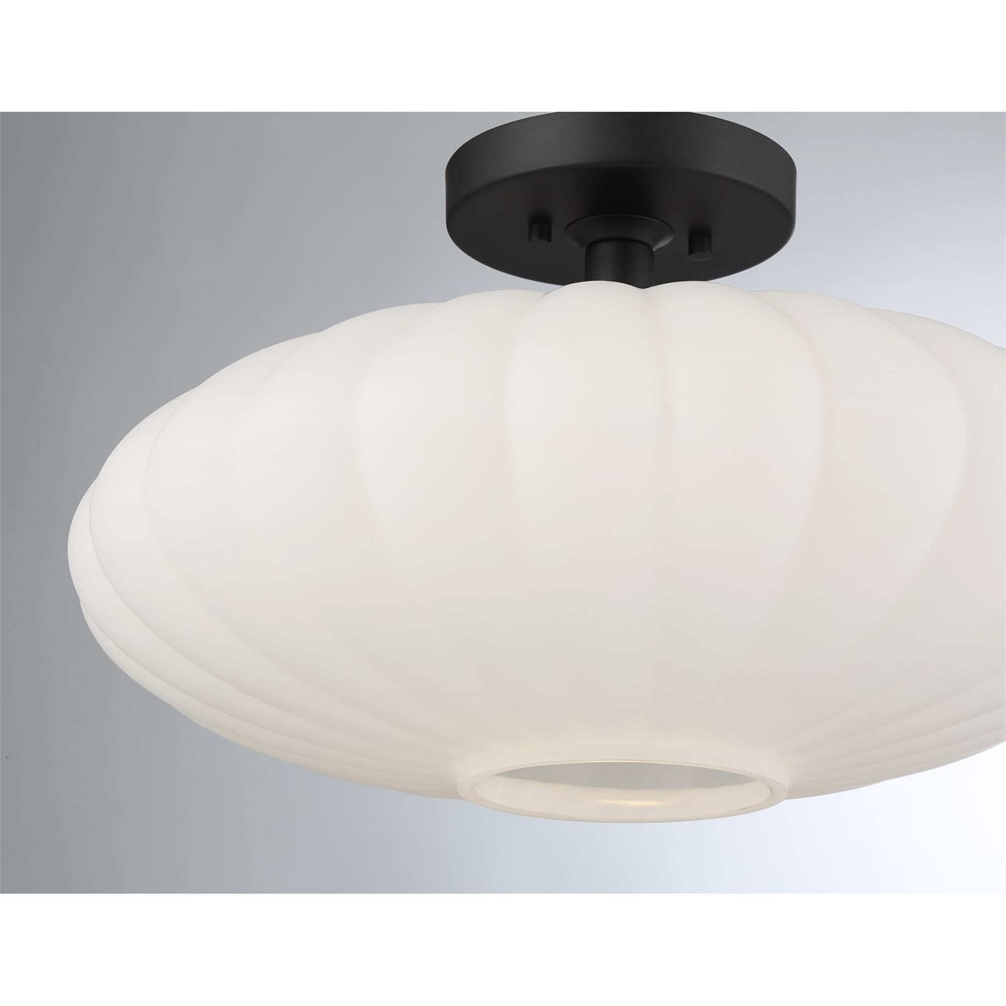 Shown in Matte Black finish and White Strie glass