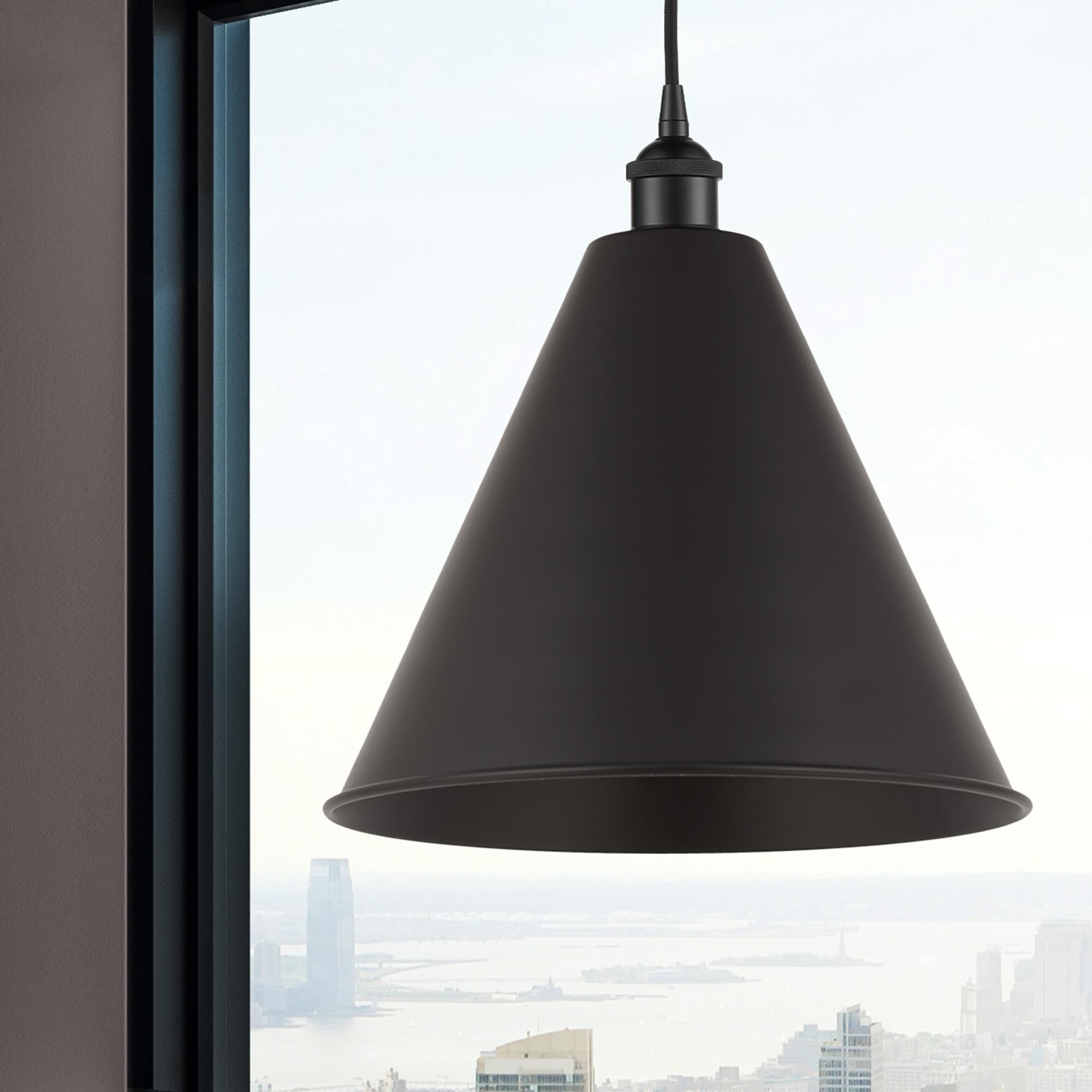 Shown in Matte Black finish and Matte Black Edison Cone shade