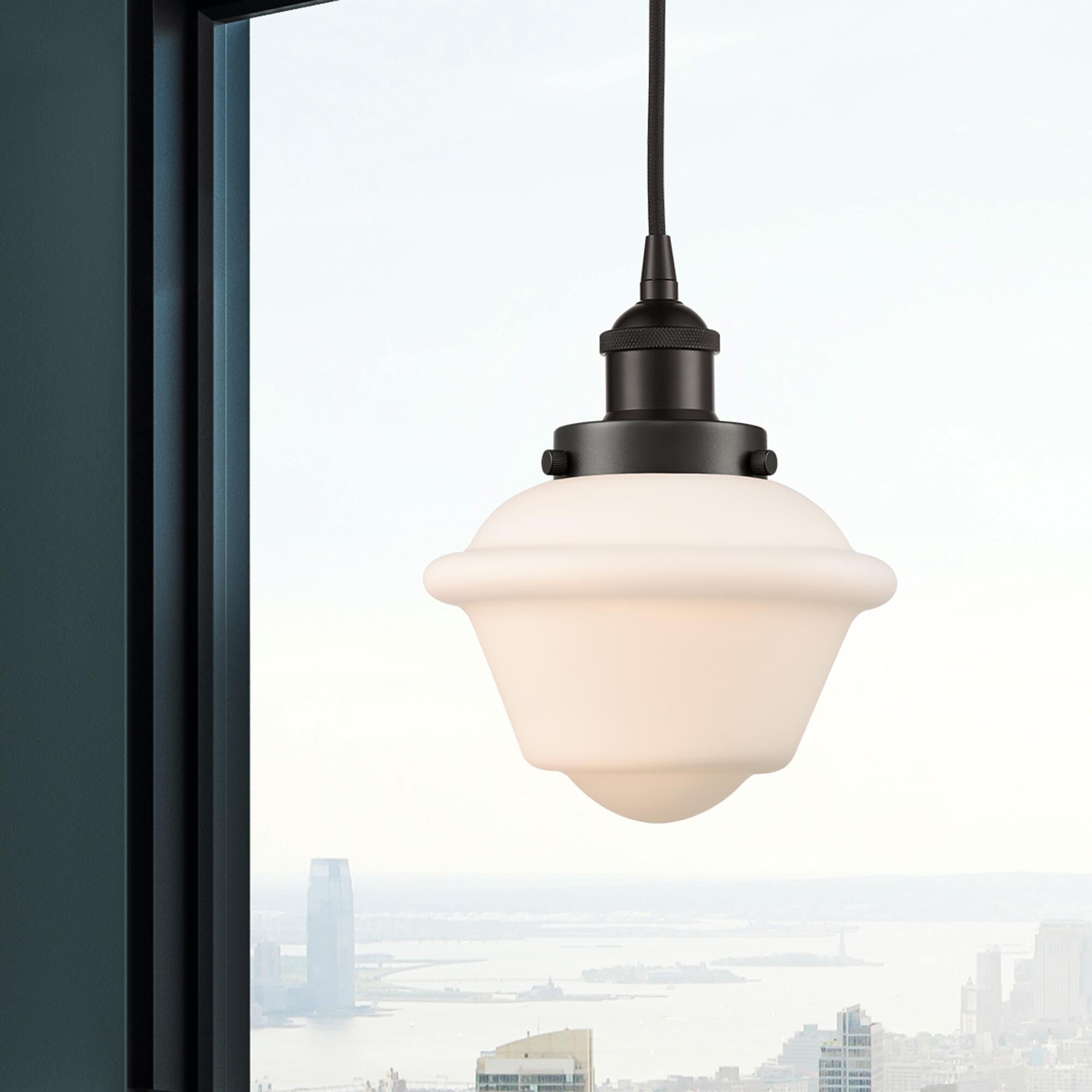 Shown in Oil Rubbed Bronze finish and Matte White Cased Small Oxford glass