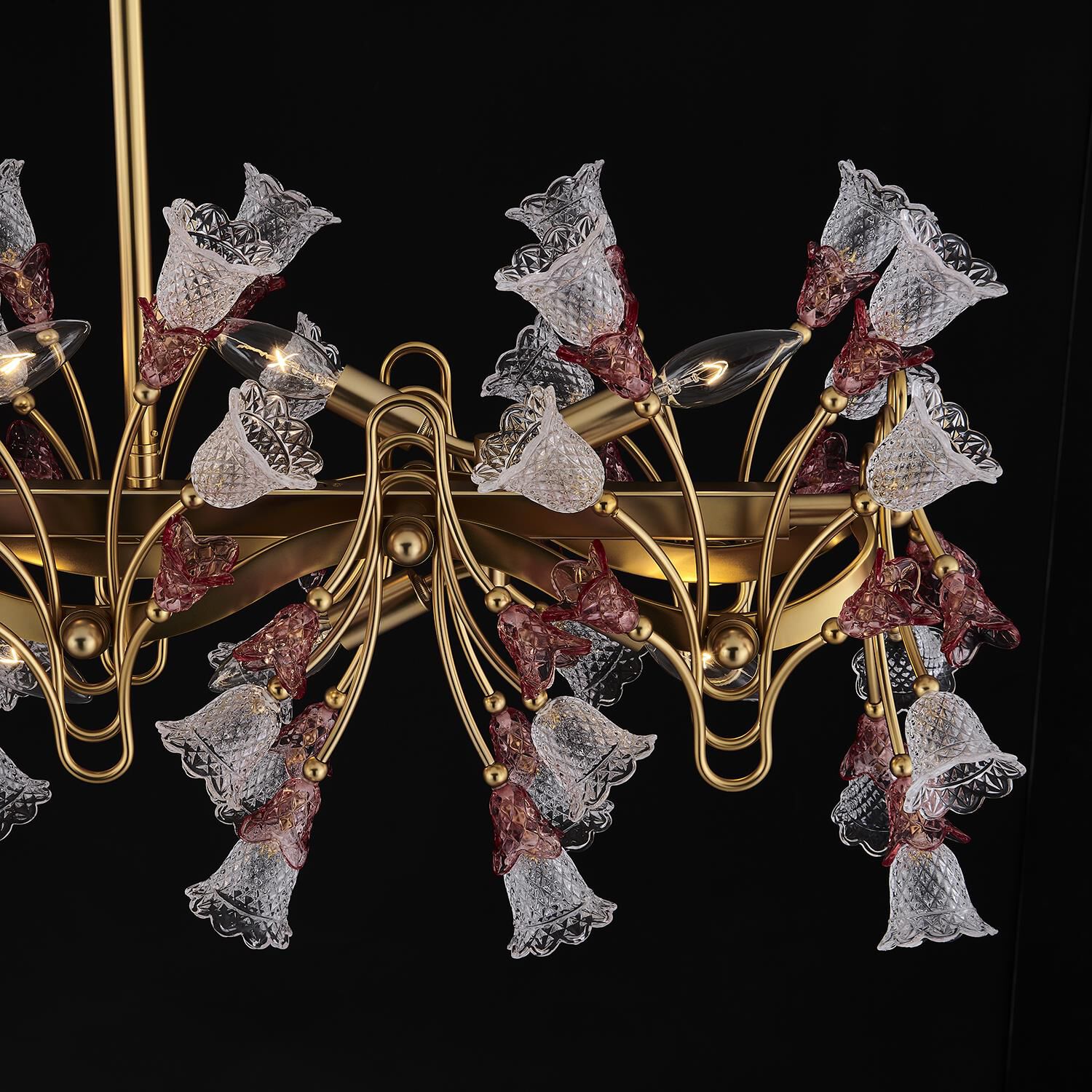 Shown in Antique Brass finish and Vintage Rose crystal