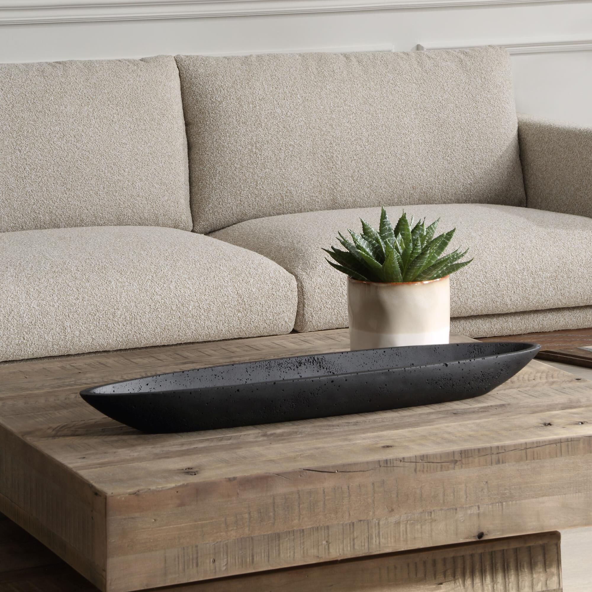 Shown in Embrace The Perfect Fusion Of Aesthetics And Utility With This Canoe-Shaped Bowl, Crafted From A Uni finish