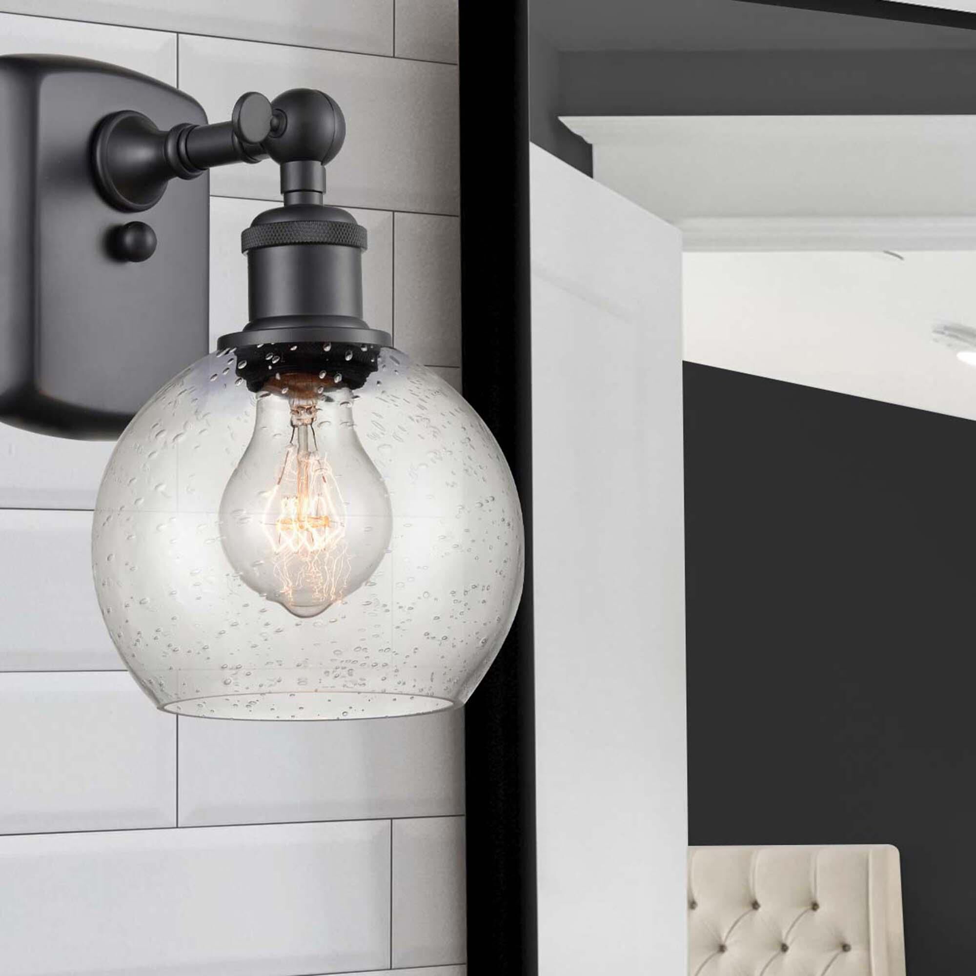 Shown in Matte Black finish and Seedy Athens glass and No Shade shade