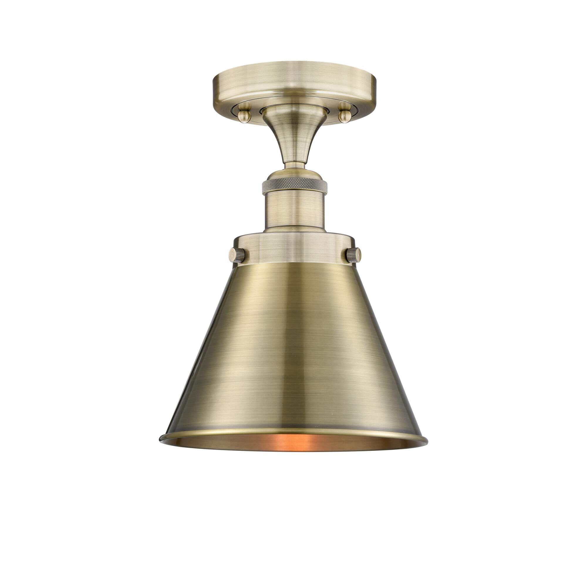 Shown in Antique Brass finish and Antique Brass shade