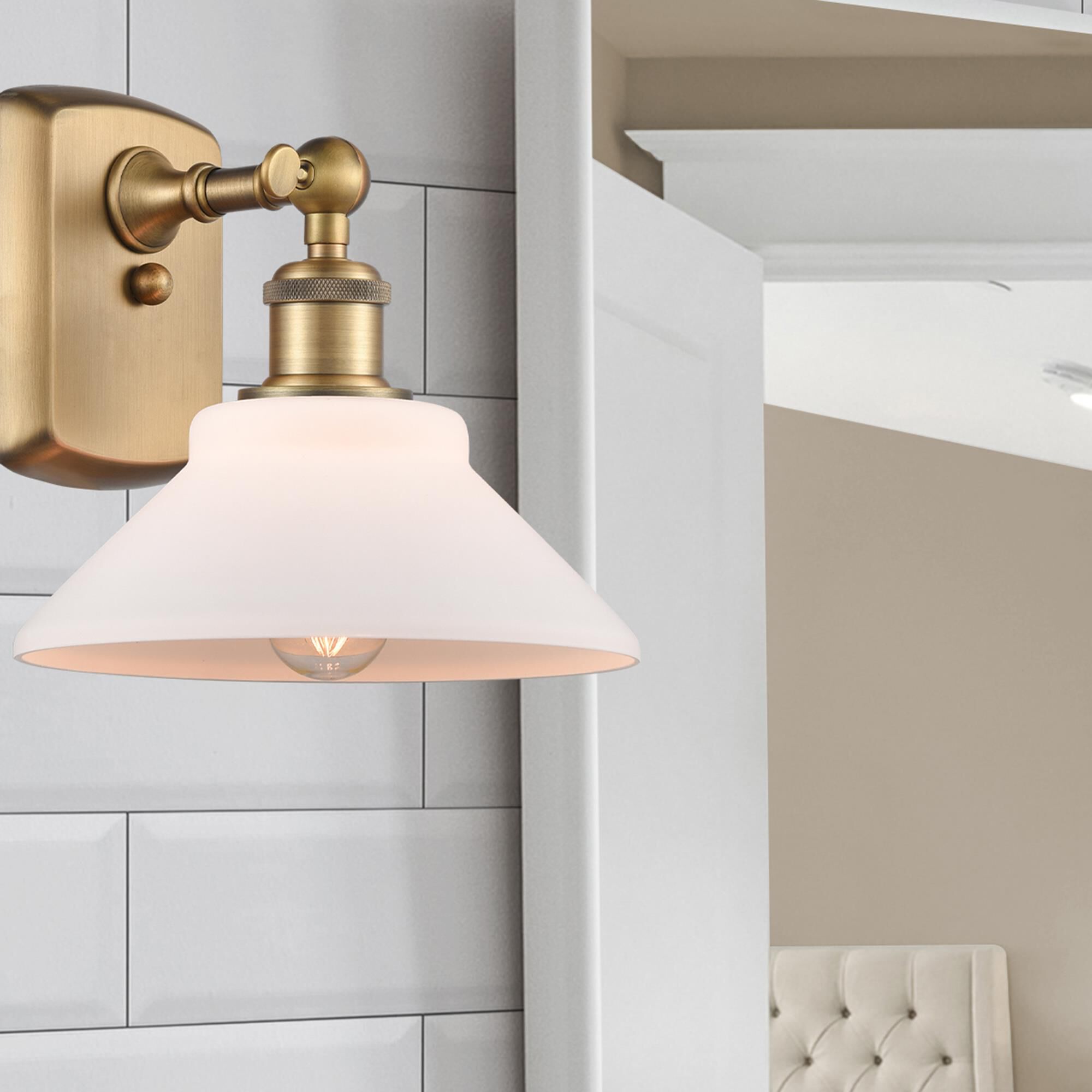 Shown in Brushed Brass finish and Disc glass and Glass shade