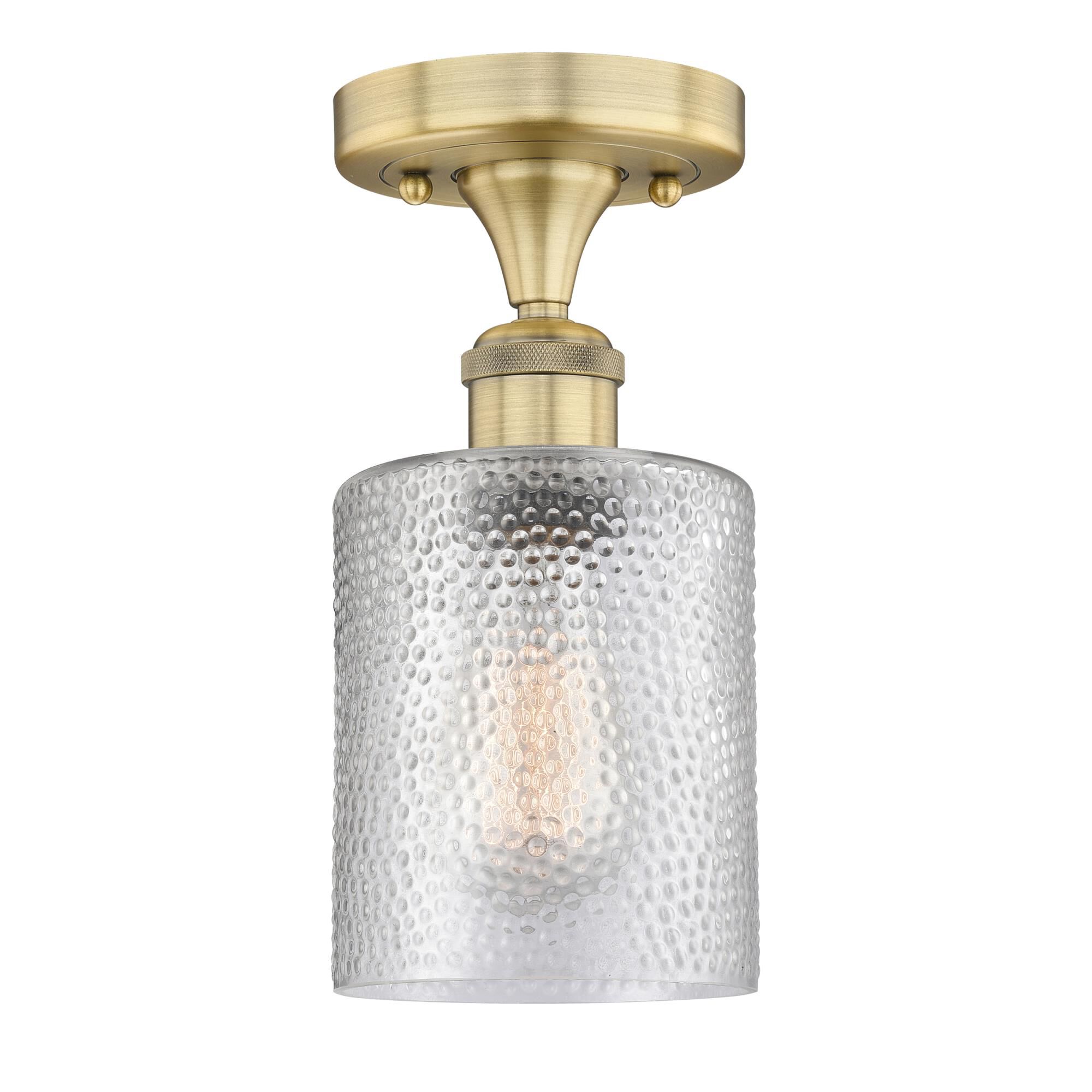 Shown in Brushed Brass finish and Clear glass