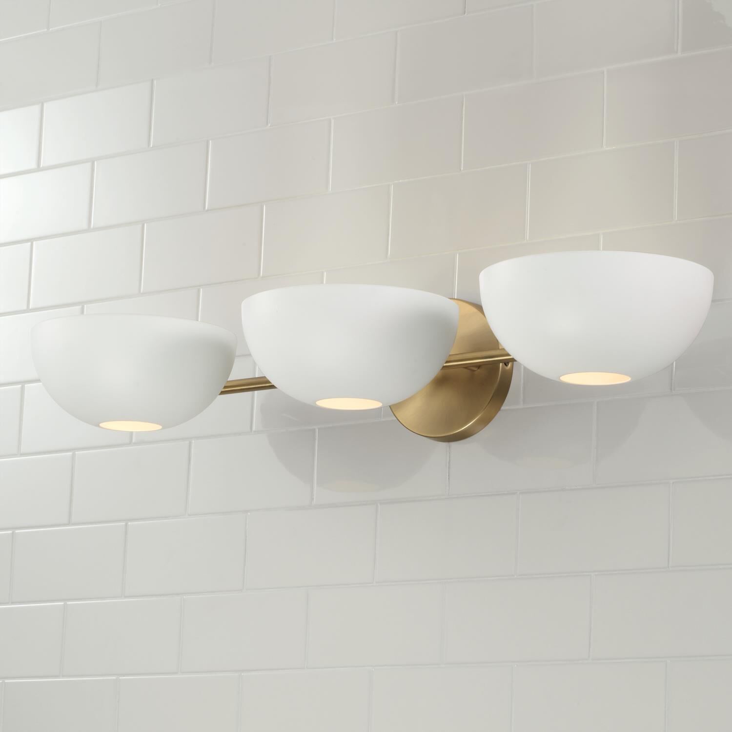 Shown in Aged Brass and White finish and Matte White Metal shade