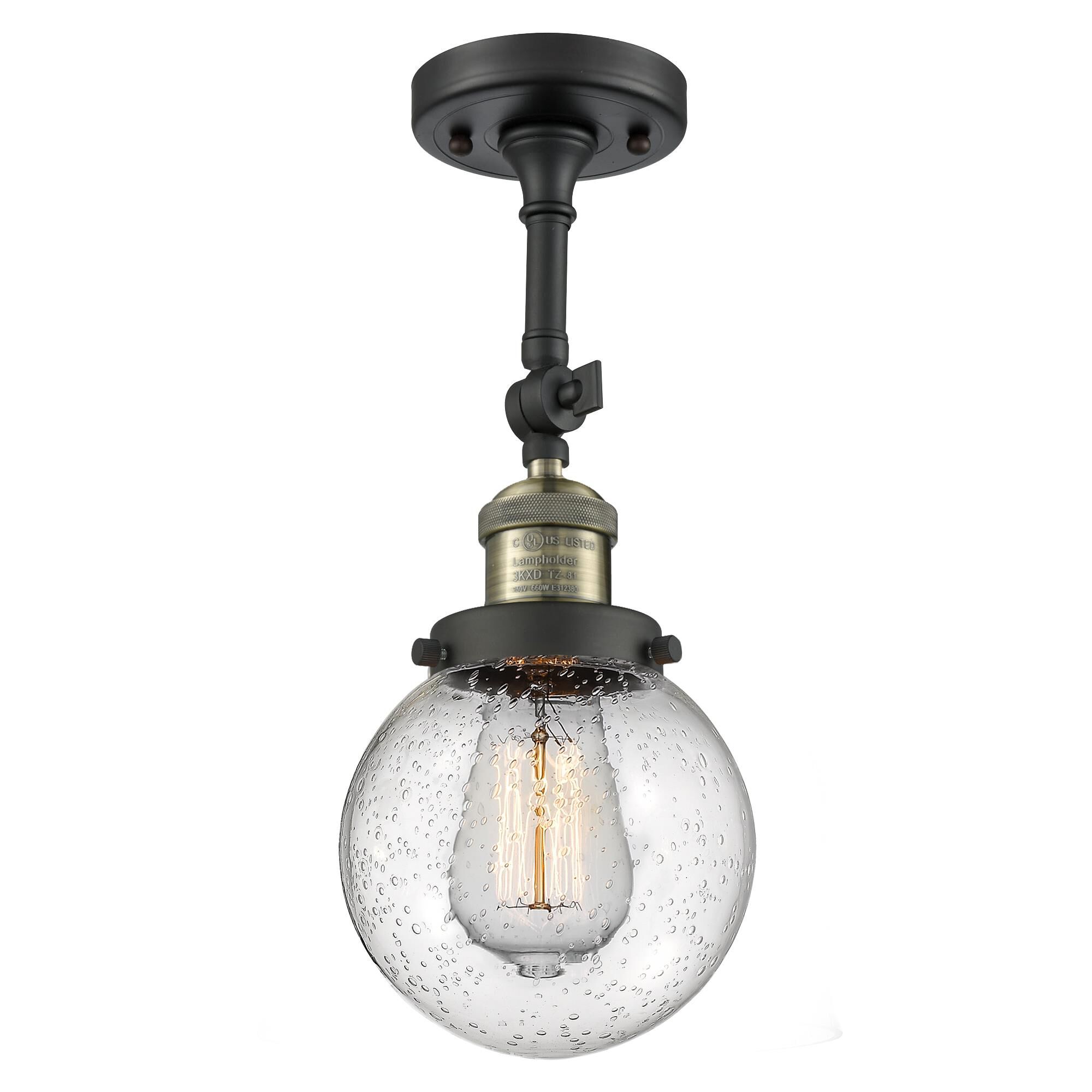 Shown in Black Antique Brass finish and Seedy glass and No Accent accent