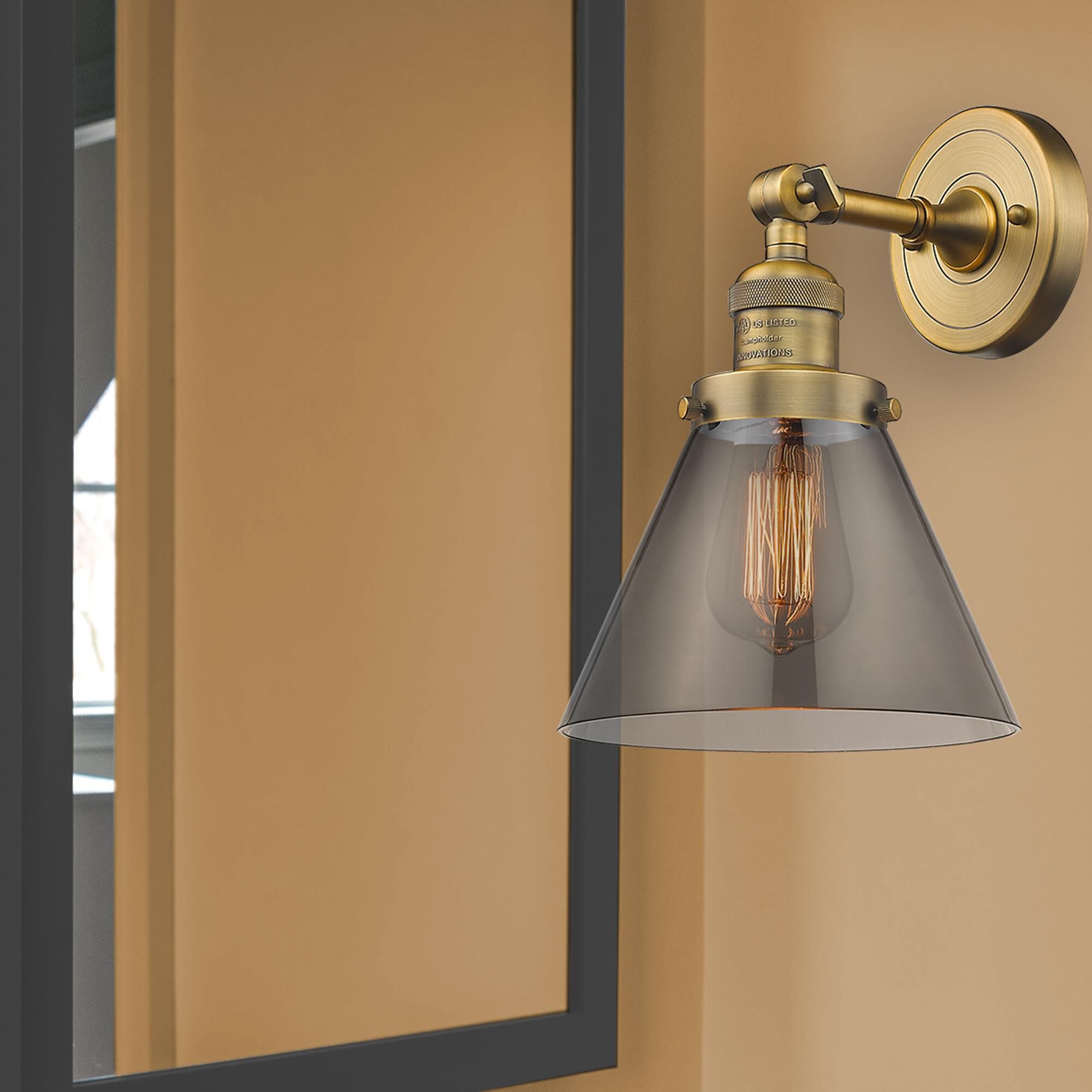 Shown in Brushed Brass finish and Smoked glass