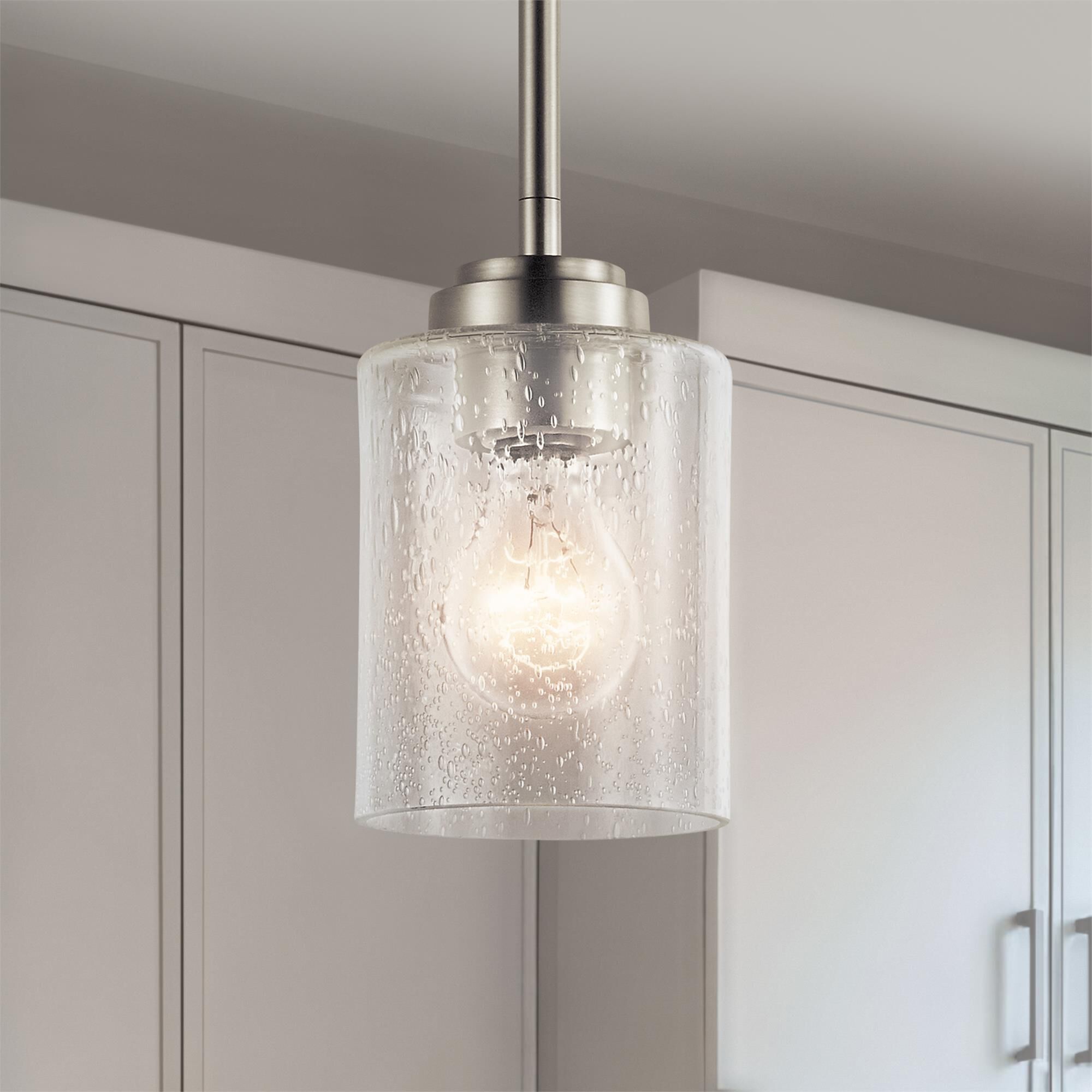 Shown in Brushed Nickel finish and Clear Seeded glass