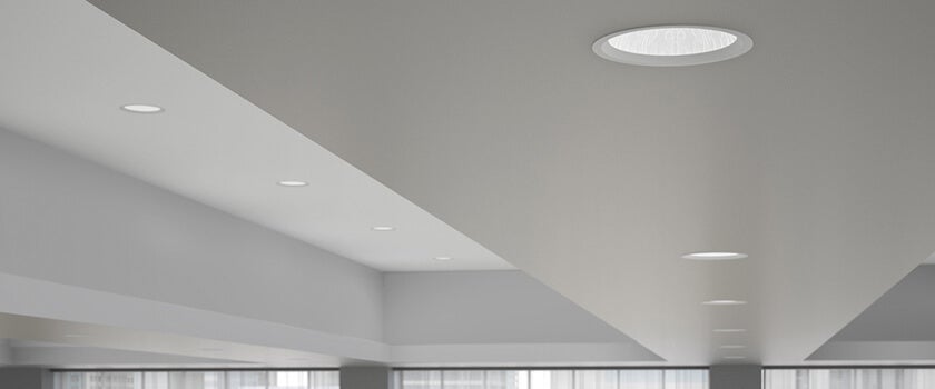 Recessed lighting trim and housing in modern ceiling from Capitol Lighting.