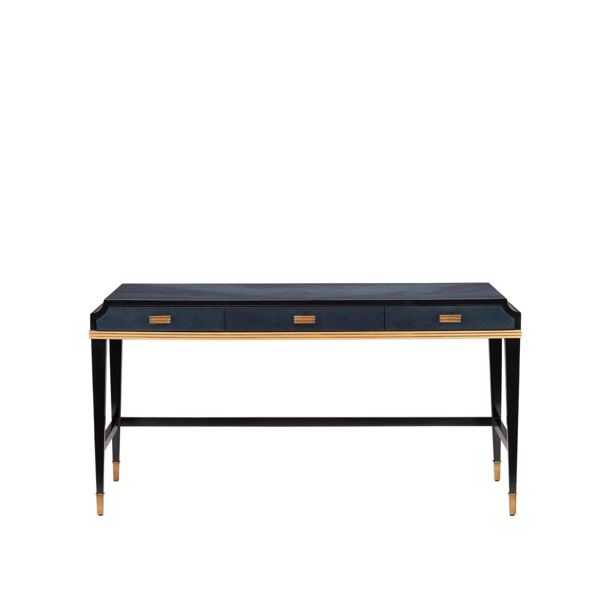 A full view of a blue and gold desk with three drawers, long top, and black legs, shown in a front-facing angle.